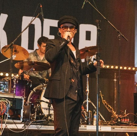 Tom Glynn-Carney with his band Sleep Walking Animals at some concert. 